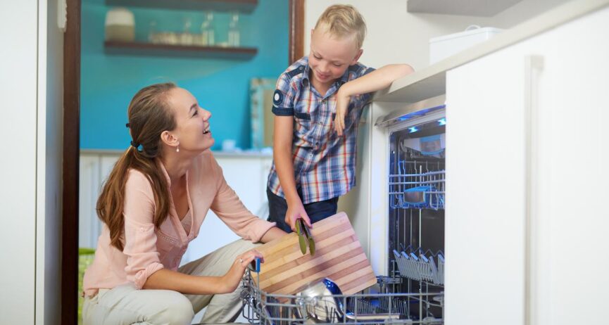 Mum and Son loading the dishwasher